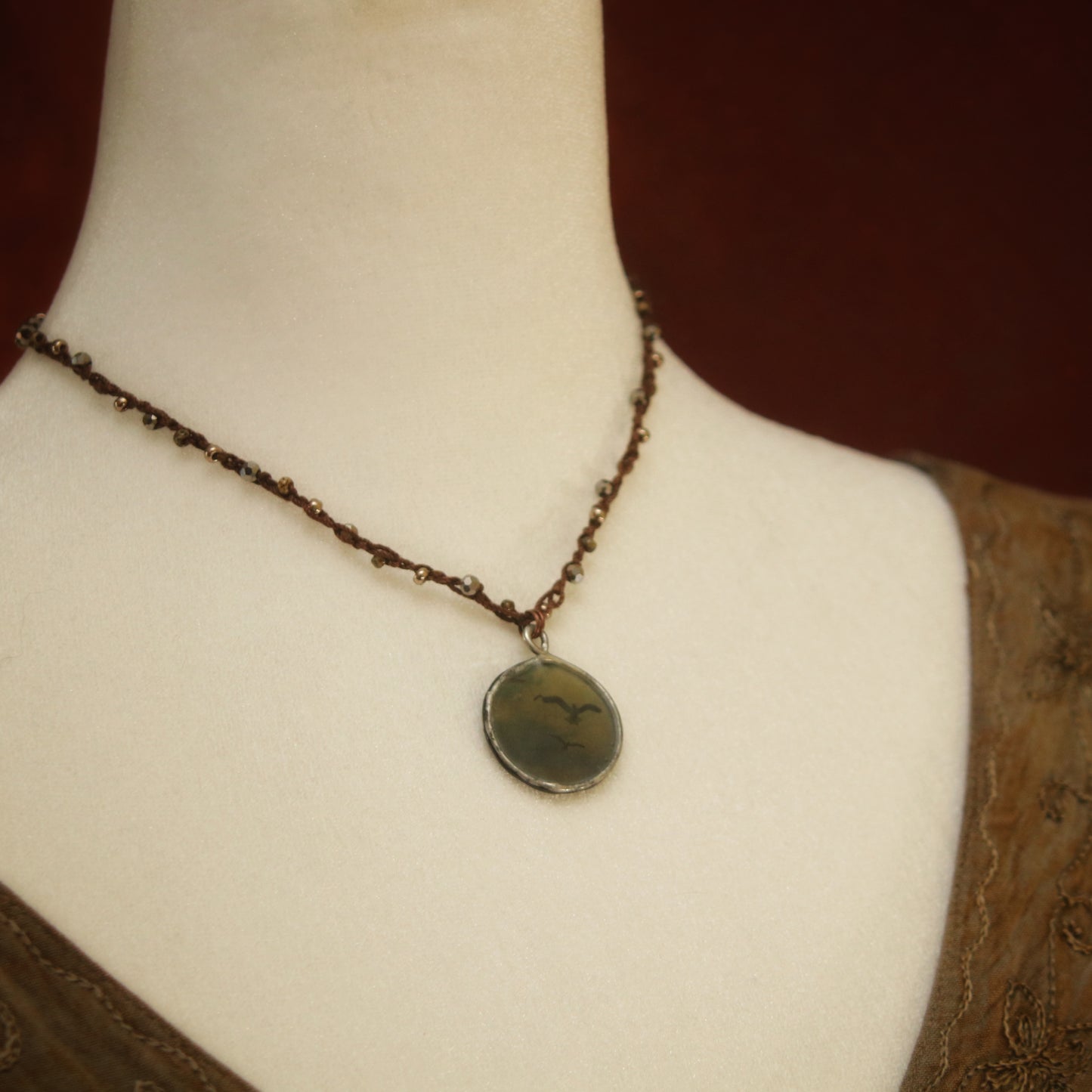 The Flight - pictorial hand-beaded crochet necklace