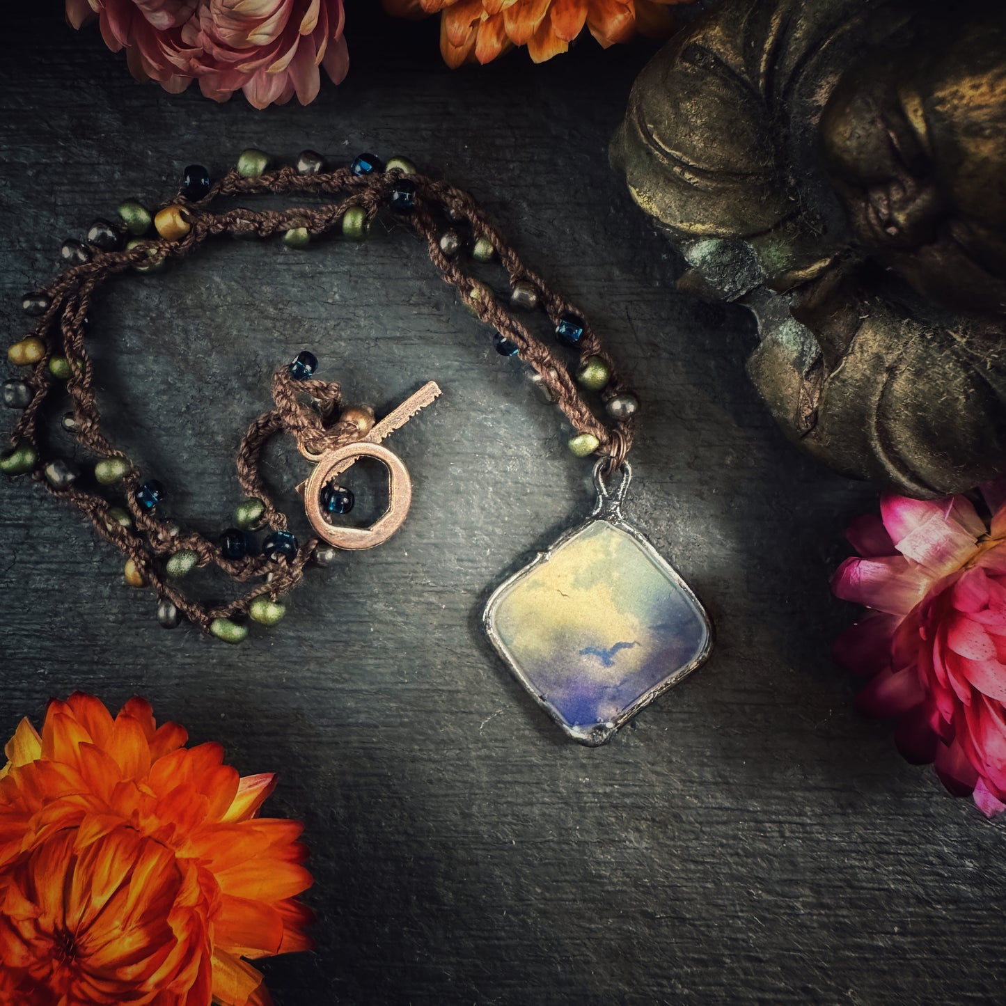 The Flight - pictorial hand-beaded crochet necklace