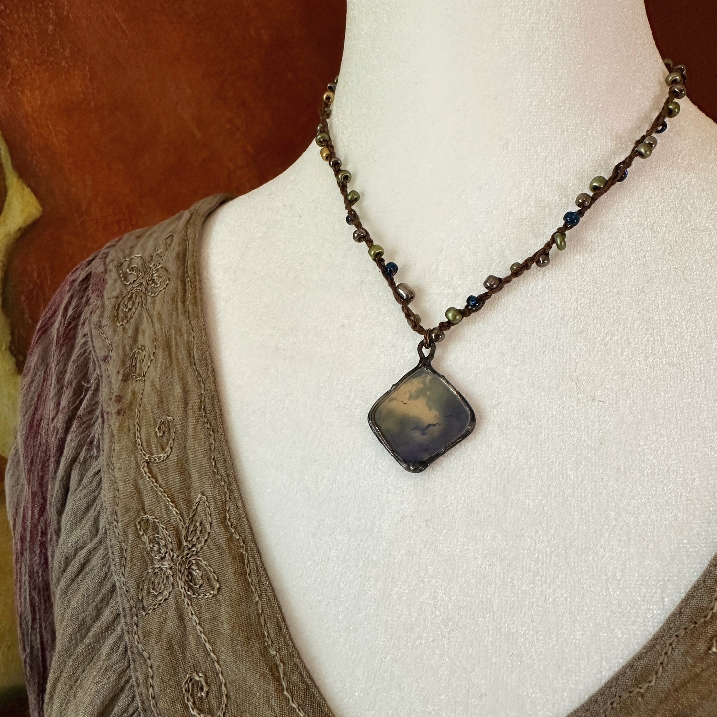 The Flight - pictorial hand-beaded crochet necklace