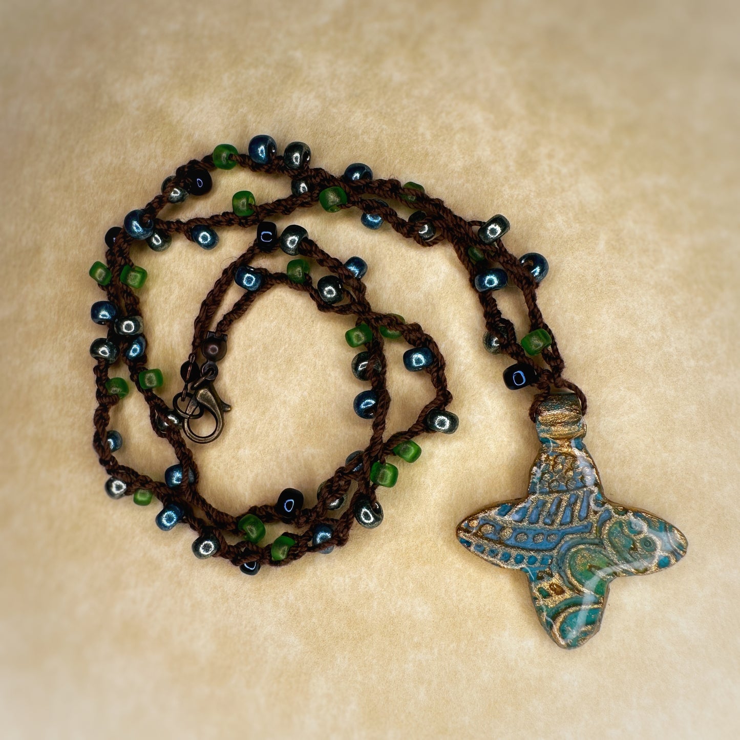 The Aurélie - in azure and verdigris - ceramic quatrefoil and hand-beaded crochet necklace