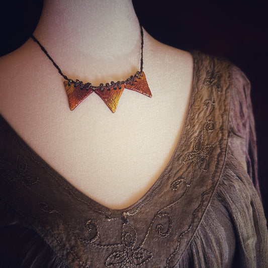 The Lakshmi - in crimson and mandarin - ceramic and hand-beaded crochet necklace