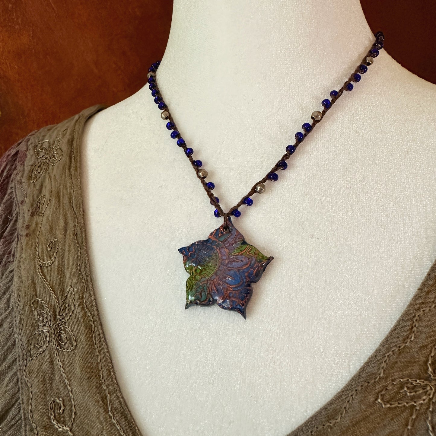 The Thalia - in sapphire and emerald - ceramic and hand-beaded crochet necklace