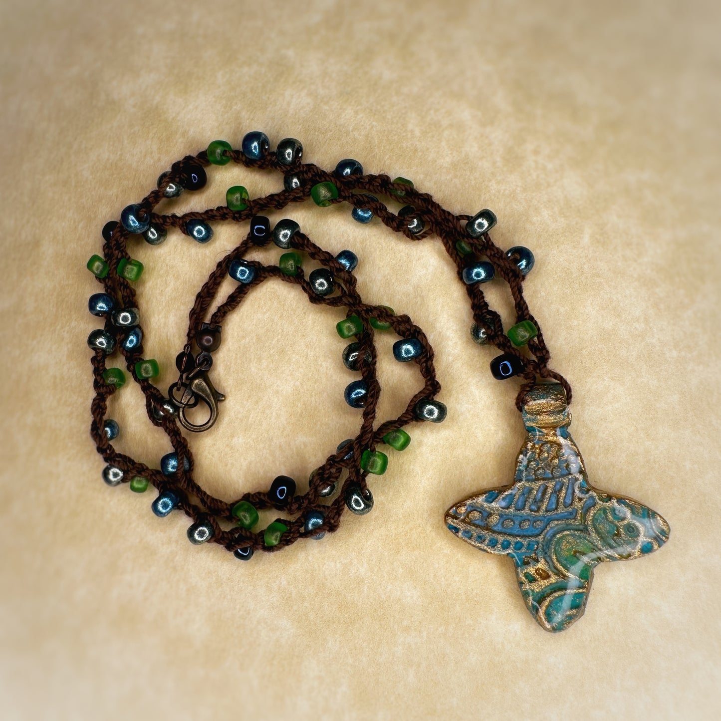 The Aurélie - in azure and verdigris - ceramic quatrefoil and hand-beaded crochet necklace